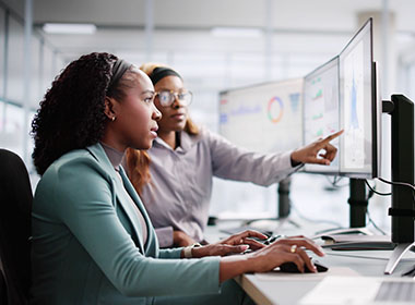 female-corporate-analyst-managing-market-data