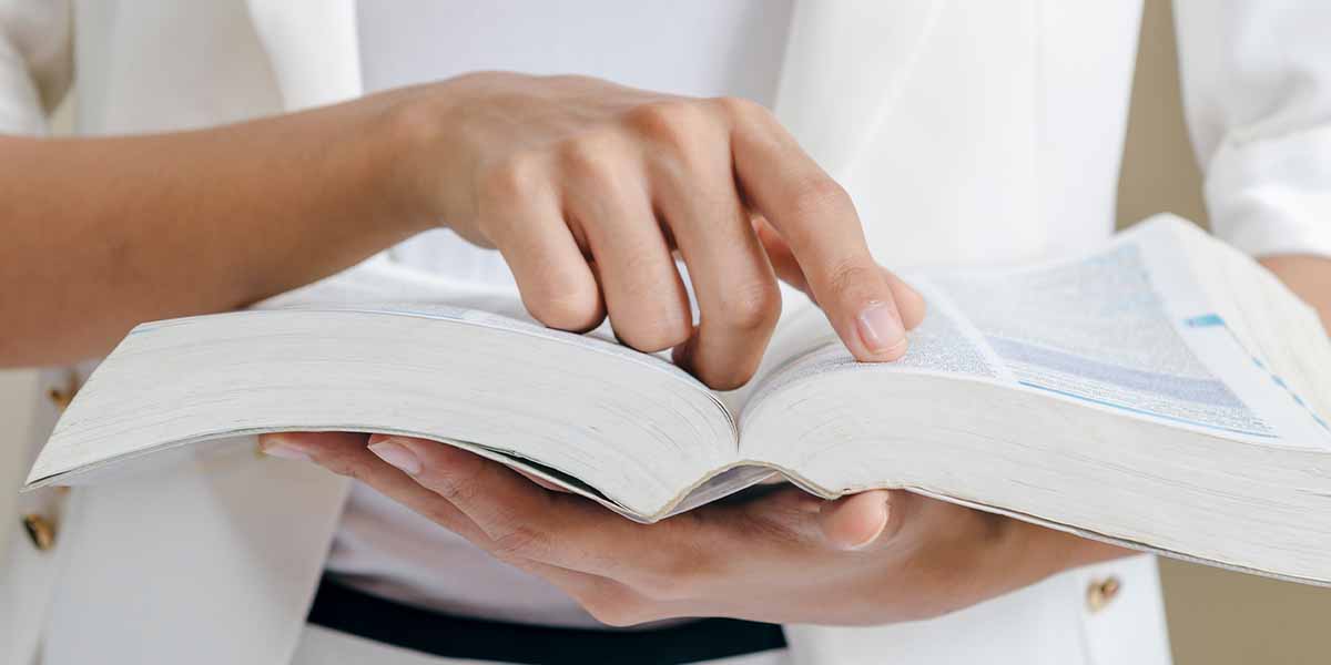 Reading a professional publication by Appraisal Institute